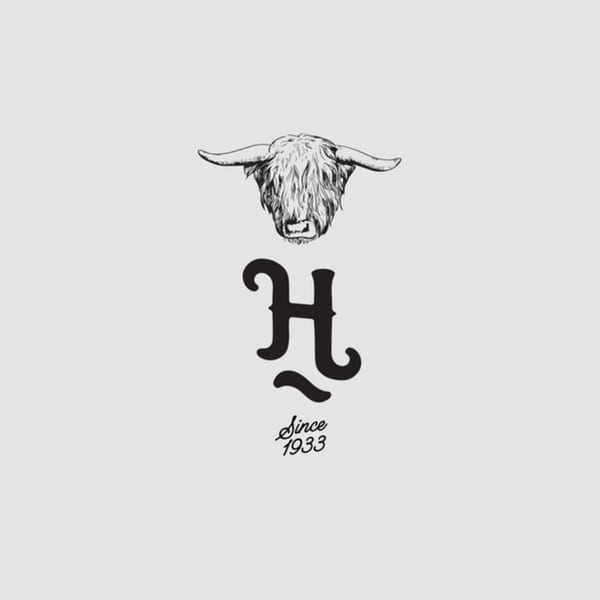 The Hub logo featuring a longhorn head above a stylized 'H' and 'Since 1933'.